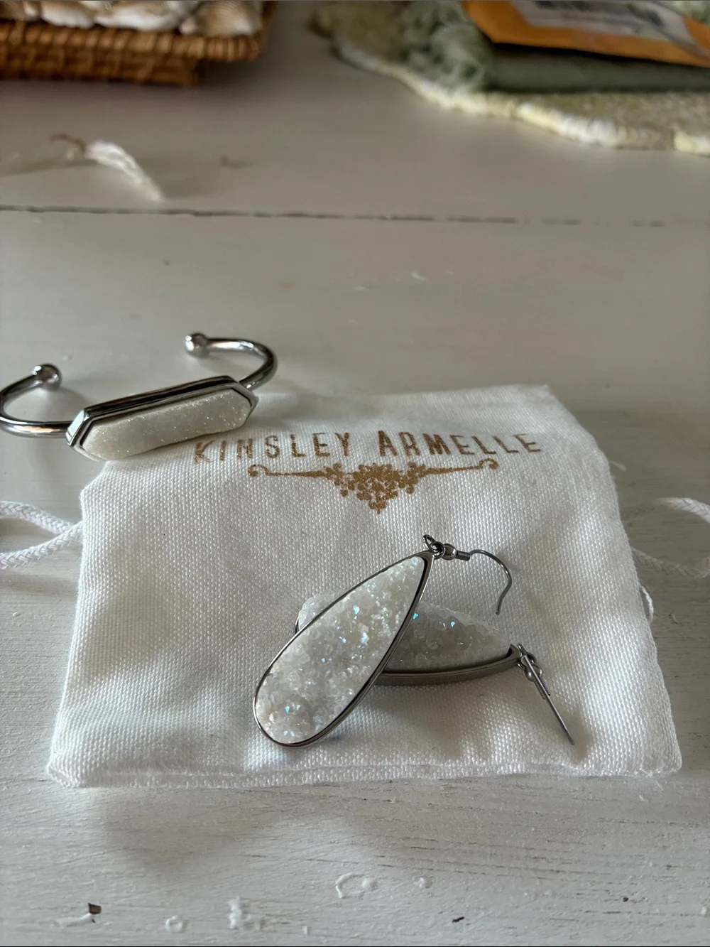 Kinsley Armelle White Druzy Teardrop Earrings and matching silver tone bracelet